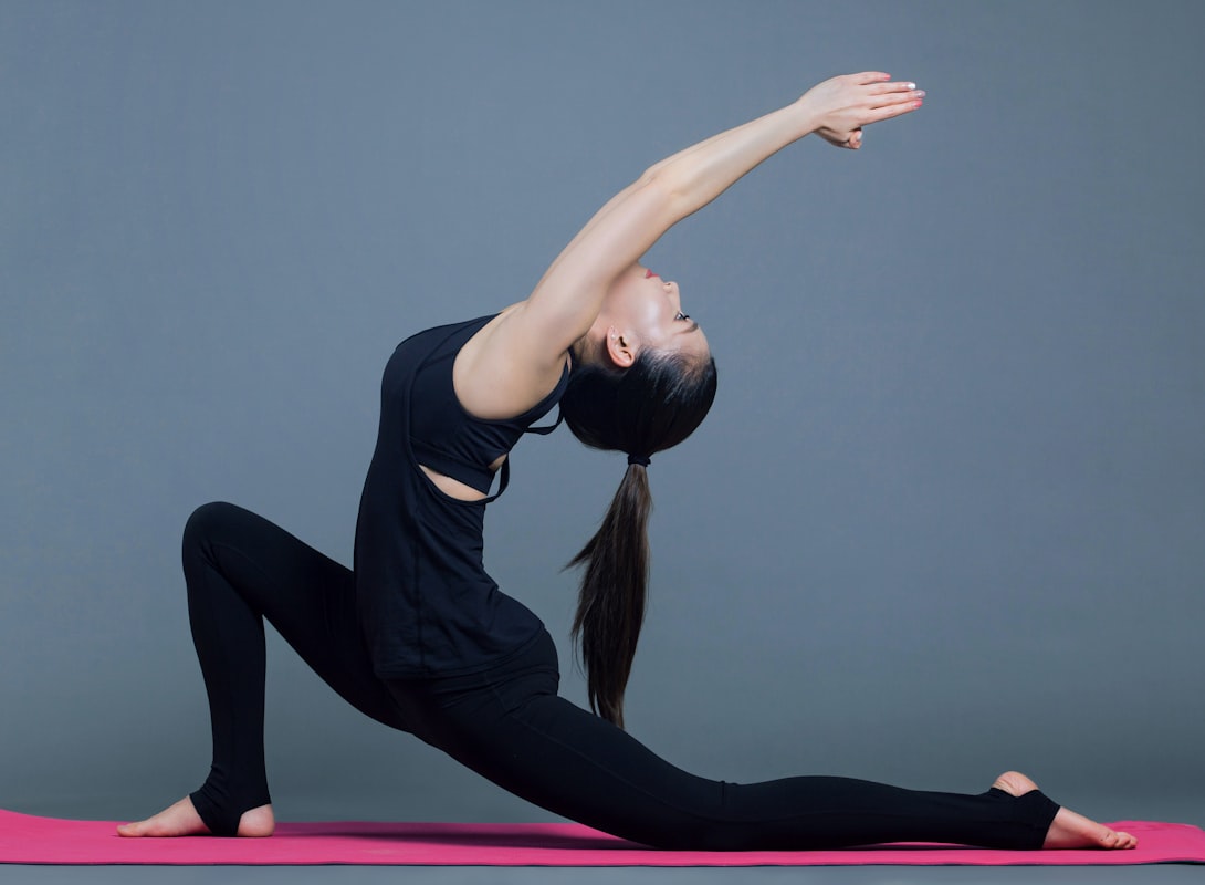 Professional demonstrating dynamic stretching exercise