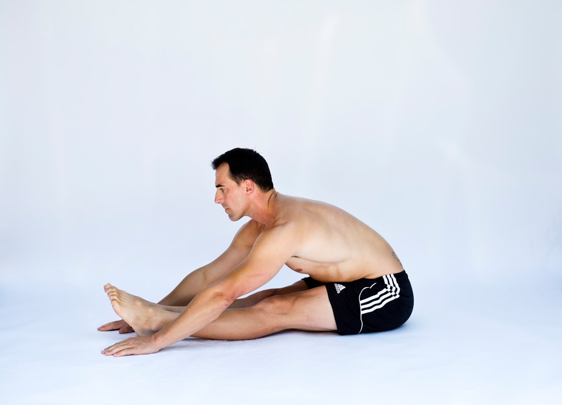 Expert demonstrating proper stretching form and technique